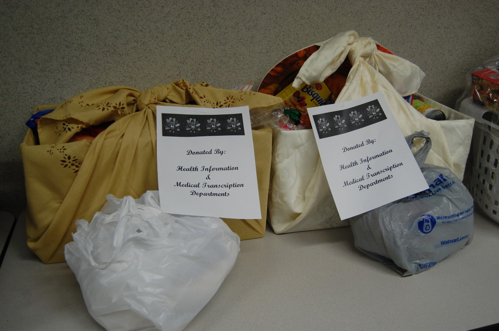 Thanksgiving baskets wrapped in a cloth tablecloth.